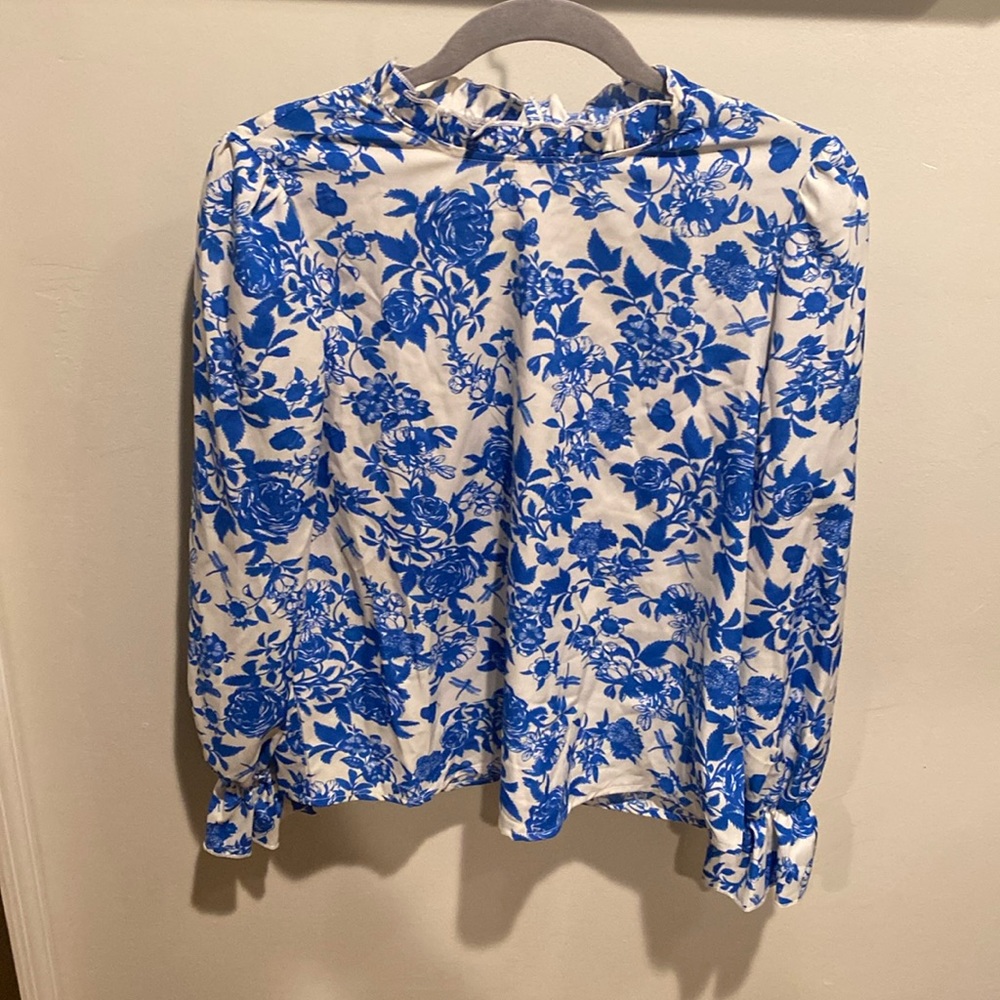 Blue and white ruffle blouse
